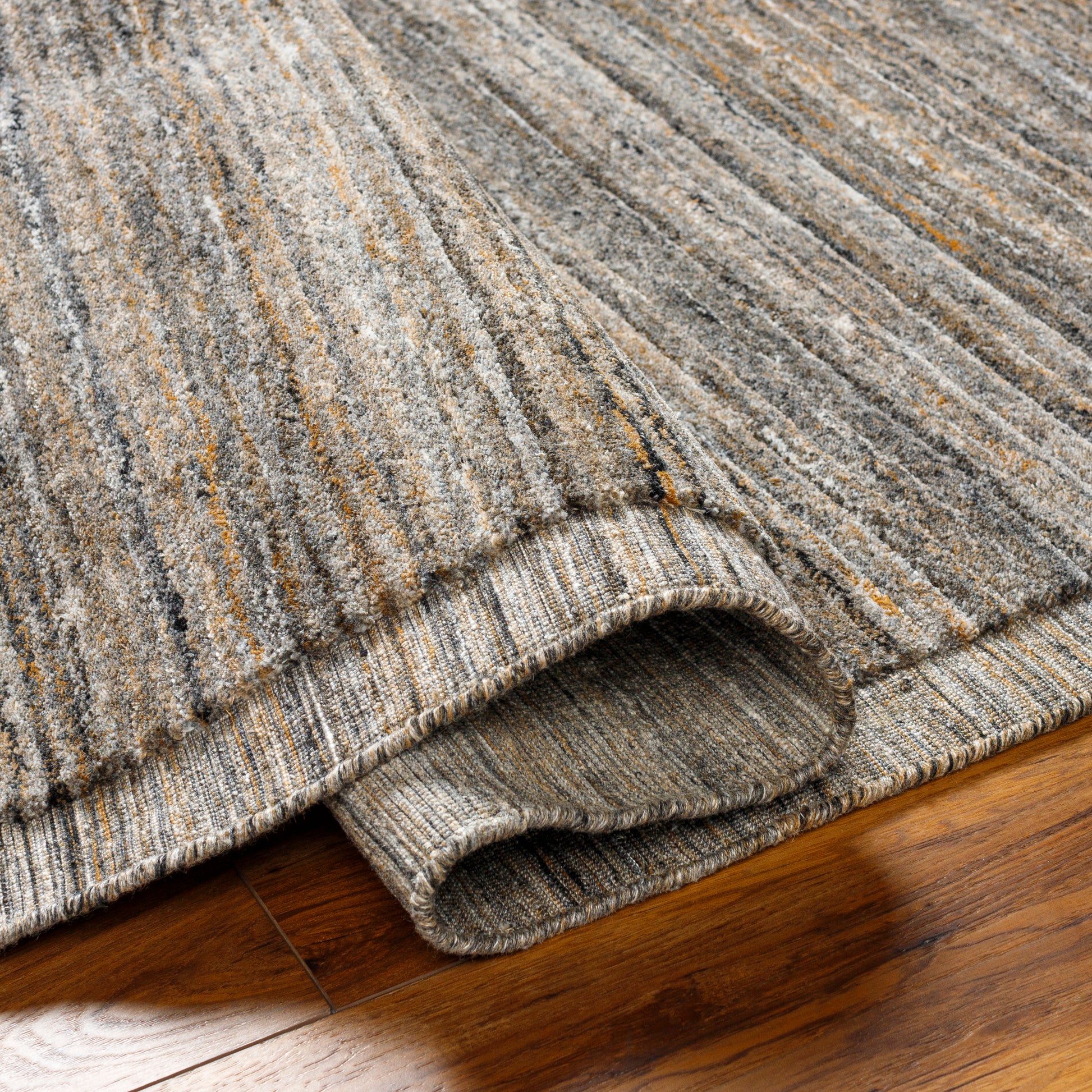 The simplistic yet compelling rugs from the Yasmin Collection effortlessly serve as the exemplar representation of modern decor. With their hand knotted construction, these rugs provide a durability that can not be found in other handmade constructions, and boasts the ability to be thoroughly cleaned as it contains no chemicals that react to water, such as glue. AmethystHome provides interior design, new construction, custom furniture, and rugs for Alpharetta metro area
