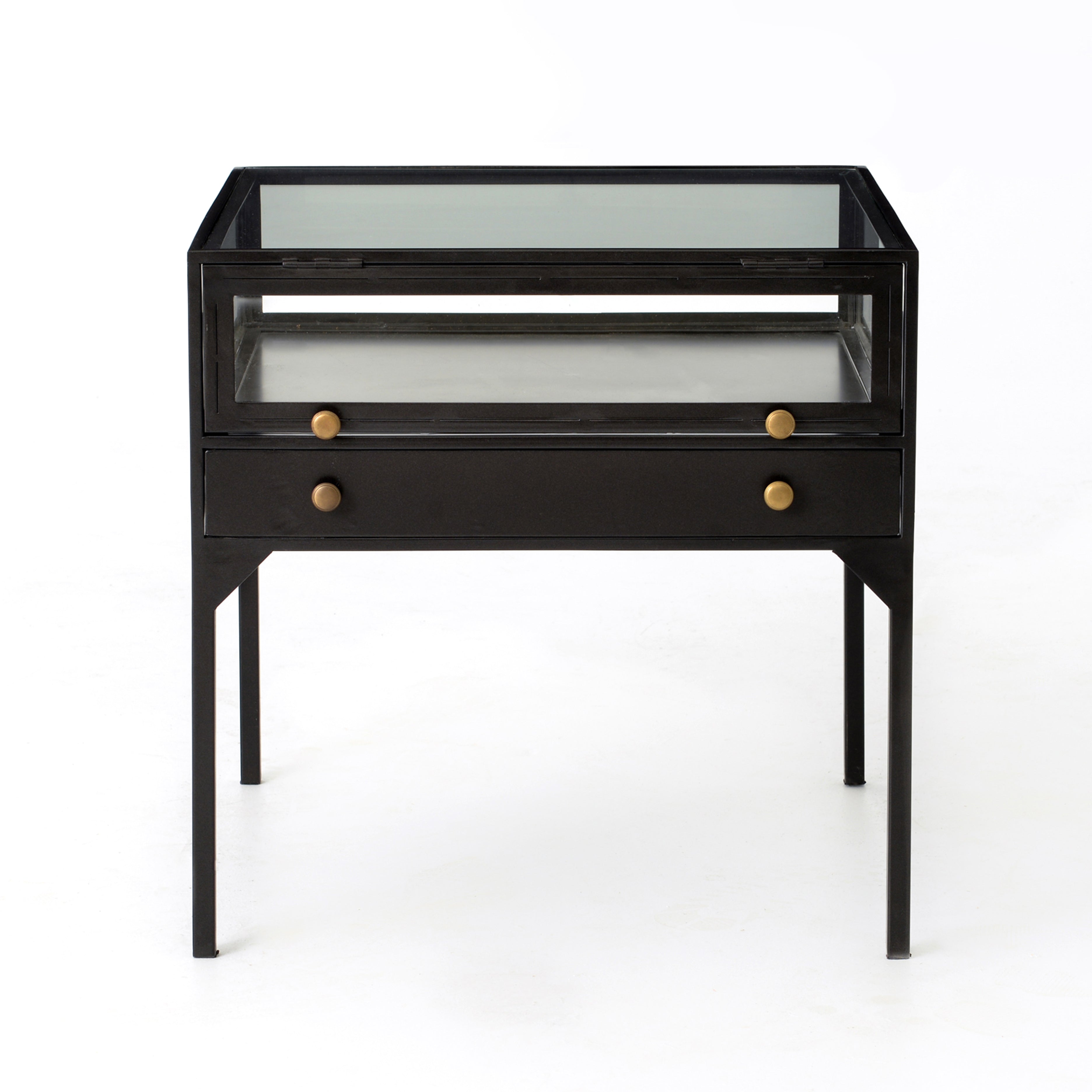 A shadowbox-inspired end table gives your inner collector a place to play. Frame prized possessions in a glass enclosure with matte-black metal and brass knobs. The perfect end table for a bed or sofa!