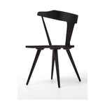 Featuring Ripley Black Dining Chair by Four Hands at Amethyst Home. This new take on the mid-century Windsor chair, the Ripley Dining Chair has a bowed, sculptural silhouette. A soft black finish adds movement to the wood by highlighting the natural grain of weathered oak. The chair is perfect for the chic, modern dining room look or that special nook in y.  Amethyst Home provides interior design, new home construction design consulting, vintage area rugs, and lighting in the Charlotte metro area.