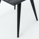 Featuring Ripley Black Dining Chair by Four Hands at Amethyst Home. This new take on the mid-century Windsor chair, the Ripley Dining Chair has a bowed, sculptural silhouette. A soft black finish adds movement to the wood by highlighting the natural grain of weathered oak. The chair is perfect for the chic, modern dining room look or that special nook in y.  Amethyst Home provides interior design, new home construction design consulting, vintage area rugs, and lighting in the San Diego metro area.