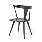 Featuring Ripley Black Dining Chair by Four Hands at Amethyst Home. This new take on the mid-century Windsor chair, the Ripley Dining Chair has a bowed, sculptural silhouette. A soft black finish adds movement to the wood by highlighting the natural grain of weathered oak. The chair is perfect for the chic, modern dining room look or that special nook in your.  Amethyst Home provides interior design, new home construction design consulting, vintage area rugs, and lighting in the Austin metro area.
