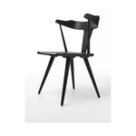 Featuring Ripley Black Dining Chair by Four Hands at Amethyst Home. This new take on the mid-century Windsor chair, the Ripley Dining Chair has a bowed, sculptural silhouette. A soft black finish adds movement to the wood by highlighting the natural grain of weathered oak. The chair is perfect for the chic, modern dining room look or that special nook in y.  Amethyst Home provides interior design, new home construction design consulting, vintage area rugs, and lighting in the Park City metro area.