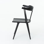 Featuring Ripley Black Dining Chair by Four Hands at Amethyst Home. This new take on the mid-century Windsor chair, the Ripley Dining Chair has a bowed, sculptural silhouette. A soft black finish adds movement to the wood by highlighting the natural grain of weathered oak. The chair is perfect for the chic, modern dining room look or that special nook in your .  Amethyst Home provides interior design, new home construction design consulting, vintage area rugs, and lighting in the Omaha metro area.