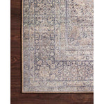 Featuring Wynter Silver / Charcoal Rug by Loloi at Amethyst Home. Old soul, new spirit. Power-loomed of 100% polyester, the Wynter Silver / Charcoal area rug showcases a one-of-a-kind vintage or antique area rug look at an affordable price. This rug brings in tones of silver, gray, blue, tan, and hints of green and ideal for high traffic areas due to the rug.  Amethyst Home provides interior design, new home construction design consulting, vintage area rugs, and lighting in the Seattle metro area.
