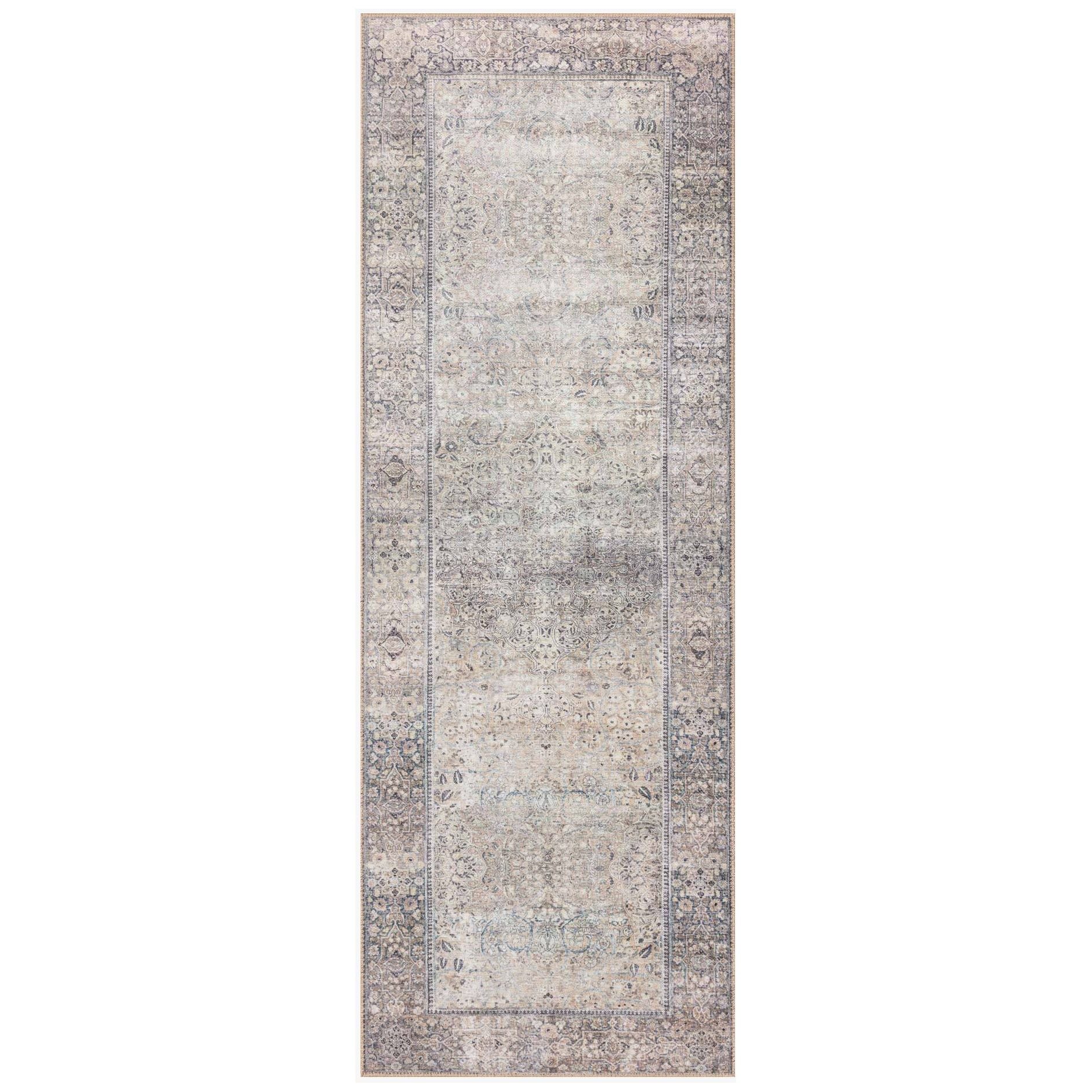 Featuring Wynter Silver / Charcoal Rug by Loloi at Amethyst Home. Old soul, new spirit. Power-loomed of 100% polyester, the Wynter Silver / Charcoal area rug showcases a one-of-a-kind vintage or antique area rug look at an affordable price. This rug brings in tones of silver, gray, blue, tan, and hints of green and ideal for high traffic areas due to the.  Amethyst Home provides interior design, new home construction design consulting, vintage area rugs, and lighting in the Los Angeles metro area.