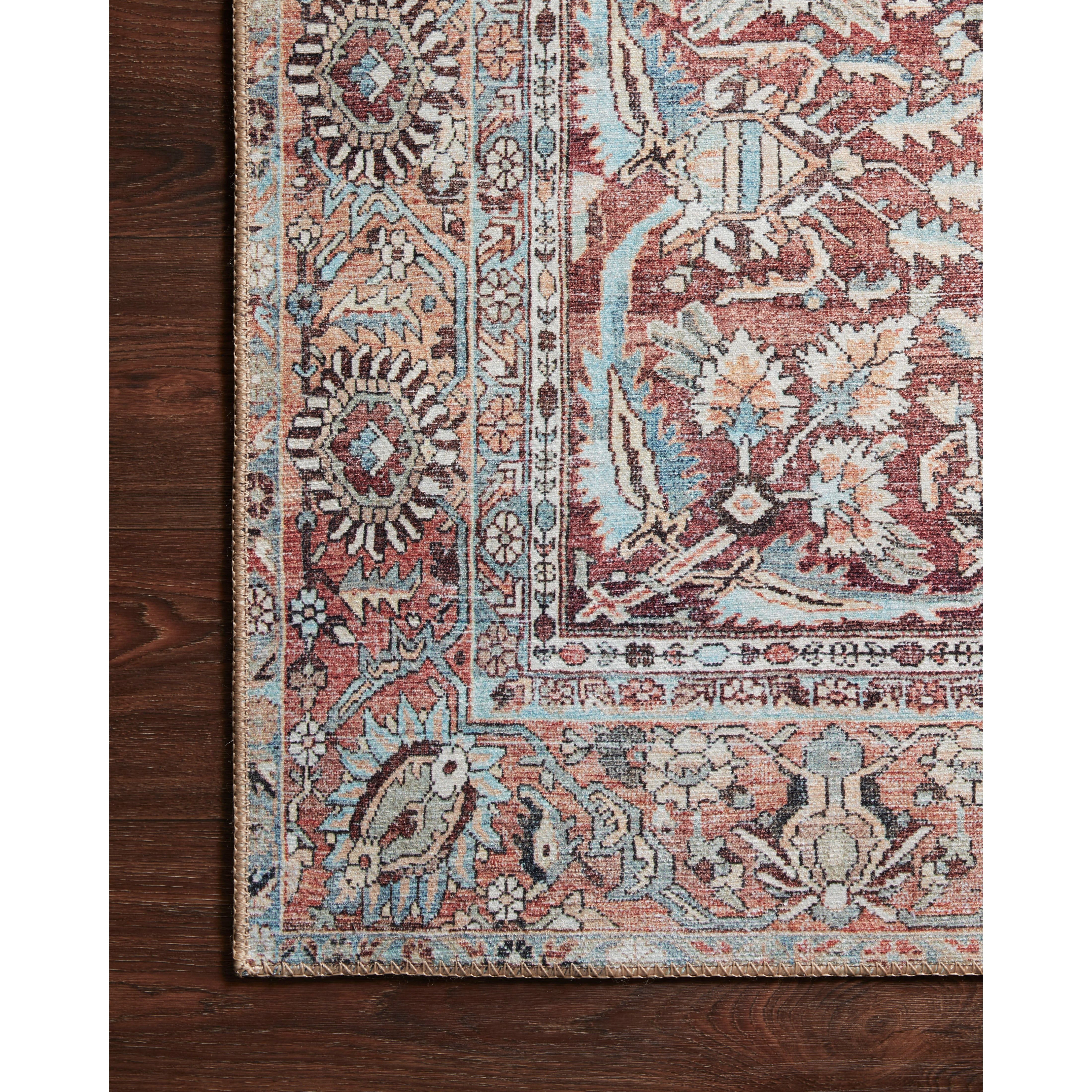 Featuring Wynter Tomato / Teal Rug by Loloi at Amethyst Home. Old soul, new spirit. Power-loomed of 100% polyester, the Wynter Tomato / Teal area rug showcases a one-of-a-kind vintage or antique area rug look at an affordable price. This rug brings in tones of red, blue, orange, and hints of ivory, and ideal for high traffic areas due to the rug's dur.  Amethyst Home provides interior design, new home construction design consulting, vintage area rugs, and lighting in the Salt Lake City metro area.