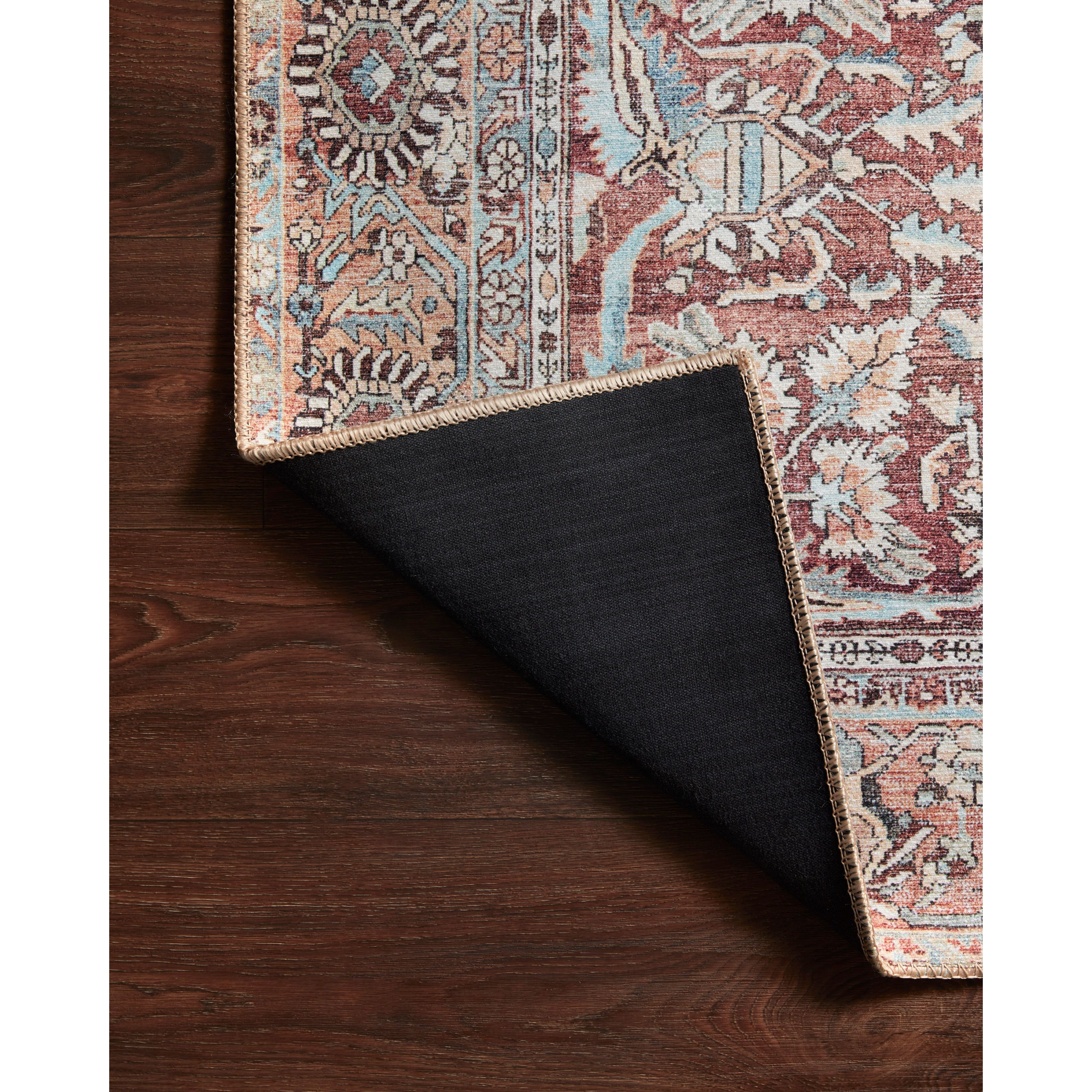 Featuring Wynter Tomato / Teal Rug by Loloi at Amethyst Home. Old soul, new spirit. Power-loomed of 100% polyester, the Wynter Tomato / Teal area rug showcases a one-of-a-kind vintage or antique area rug look at an affordable price. This rug brings in tones of red, blue, orange, and hints of ivory, and ideal for high traffic areas due to the rug's durability..  Amethyst Home provides interior design, new home construction design consulting, vintage area rugs, and lighting in the Boston metro area.