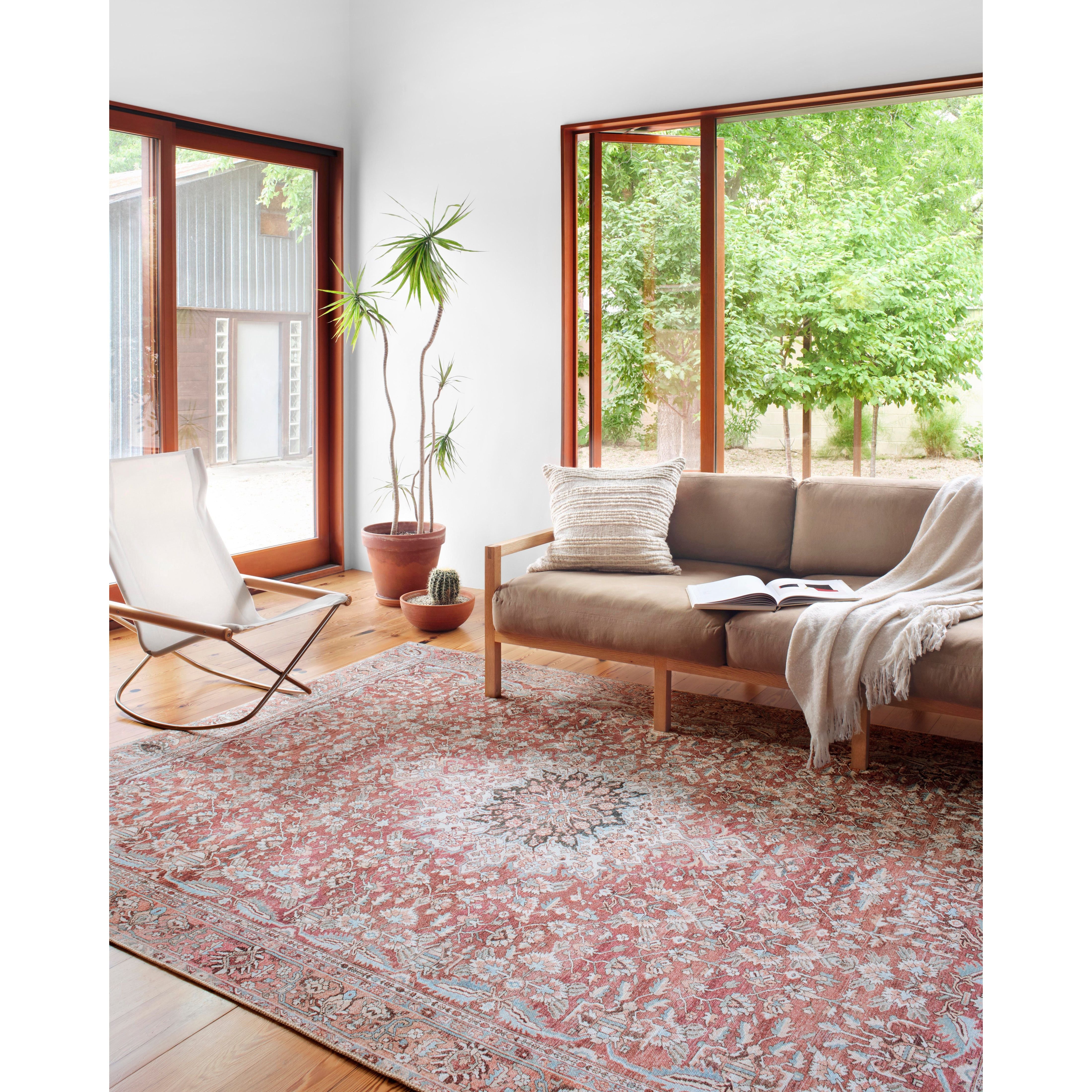 Featuring Wynter Tomato / Teal Rug by Loloi at Amethyst Home. Old soul, new spirit. Power-loomed of 100% polyester, the Wynter Tomato / Teal area rug showcases a one-of-a-kind vintage or antique area rug look at an affordable price. This rug brings in tones of red, blue, orange, and hints of ivory, and ideal for high traffic areas due to the rug's durability..  Amethyst Home provides interior design, new home construction design consulting, vintage area rugs, and lighting in the Austin metro area.