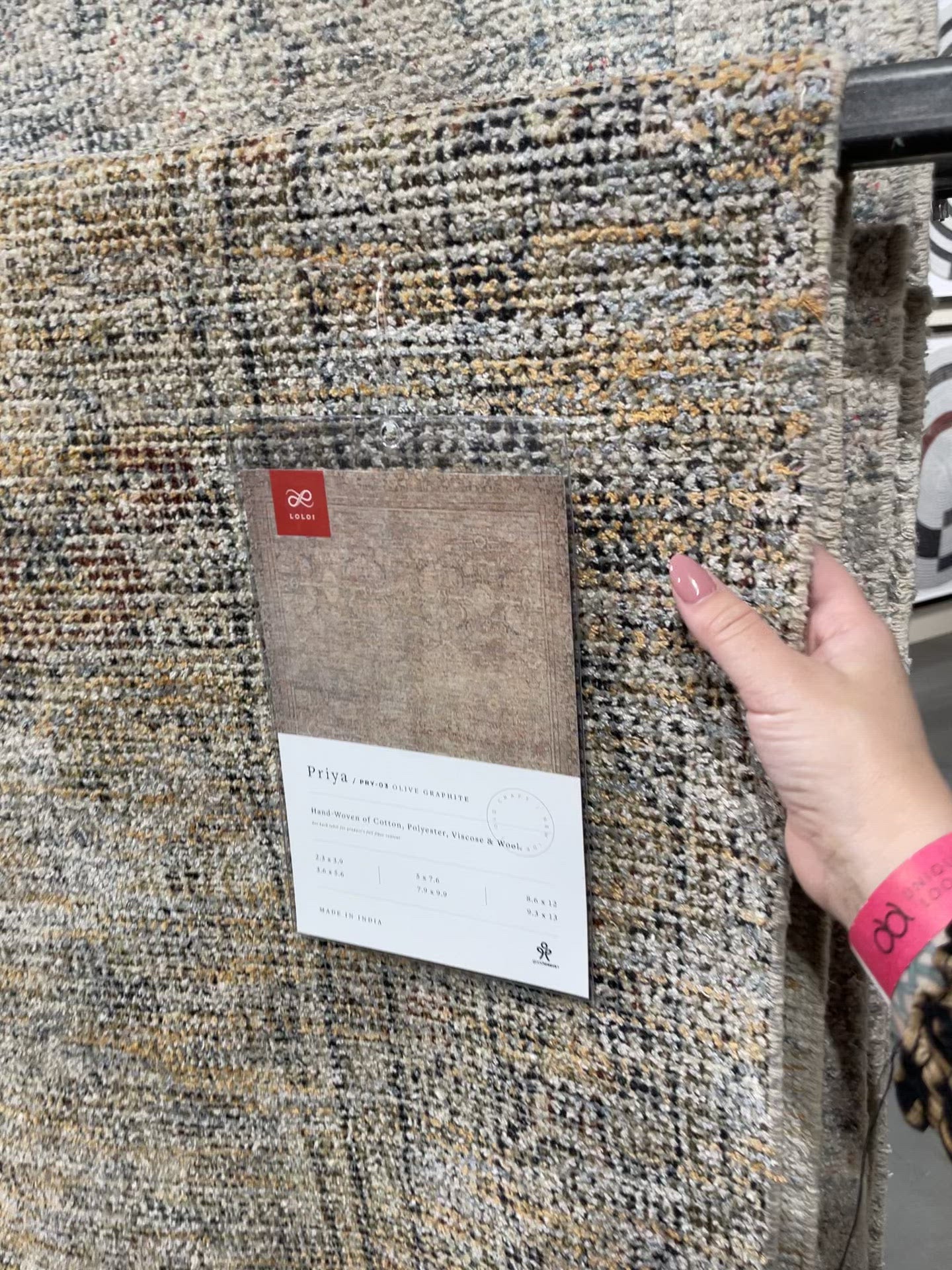 Hand-woven by skilled artisans, the Priya Olive / Graphite Area Rug from Loloi offers beautiful tonal designs accentuated by a carefully curated color palette. Delicate yet strong, Priya is an instant classic made for today's home.  Hand Woven 51% Cotton | 29% Polyester | 12% Viscose | 8% Wool PRY-03 Olive/Graphite Colors: Brown, Gold, Ivory, Blue