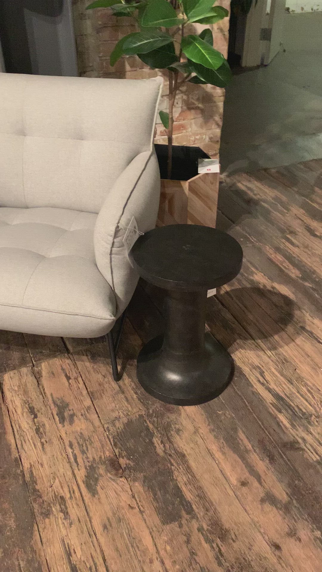Made from raw black cast aluminum, a dramatically tapered Gino End Table - Raw Black flaunts beautiful high/ low hues and subtle Brutalist vibes. Perfect for setting your book or favorite drink next to.   Overall Dimensions: 13.00"w x 13.00"d x 20.00"h