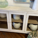 We love the rustic look the reclaimed pine and white wash finish brings to this Agno Sideboard. With six doors opening to shelves, this provided ultimate storage for all your family heirlooms, china, and other household items. 