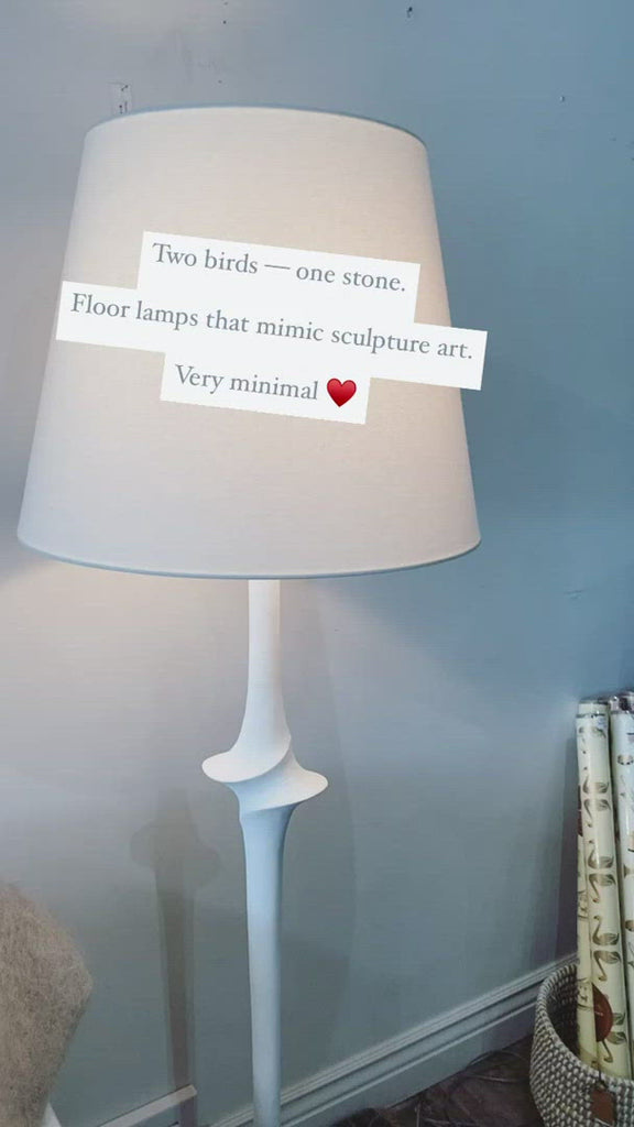 We love the detail in the middle of this Bates Large Sculpted Floor Lamp by Visual Comfort. The linen shade brings a soft, warm glow to any living room, bedroom, or other area needing extra light.  Designer: Chapman & Myers