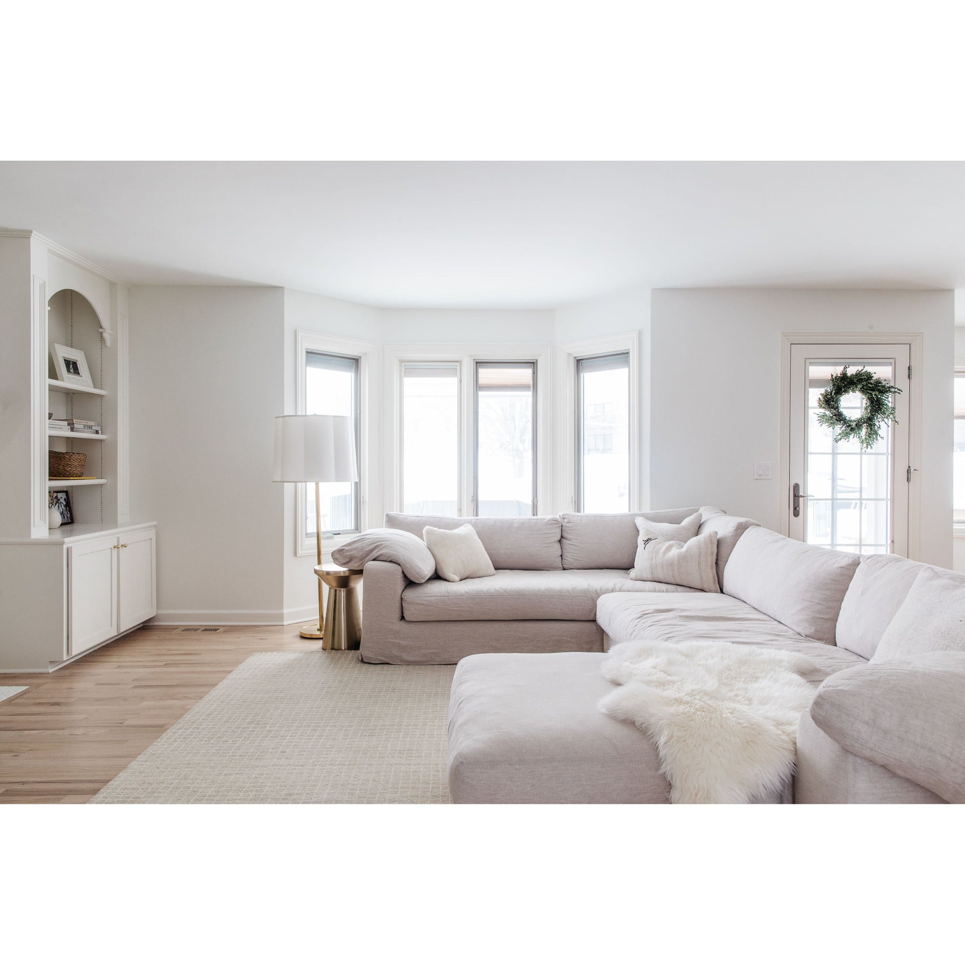 With its streamlined silhouette and strong, angular lines the Loft 2 Arm Sectional by Cisco Brothers is classic without being too traditional. It has a modern essence and elegance that lends inviting appeal to your living room. Dim the lights, and settle down with the family for an entertaining night in. Photographed in Naoki Hemp (discountinued). Shown as a Left Arm Facing Sectional.   Overall: 96"w x 130"d x 29"h