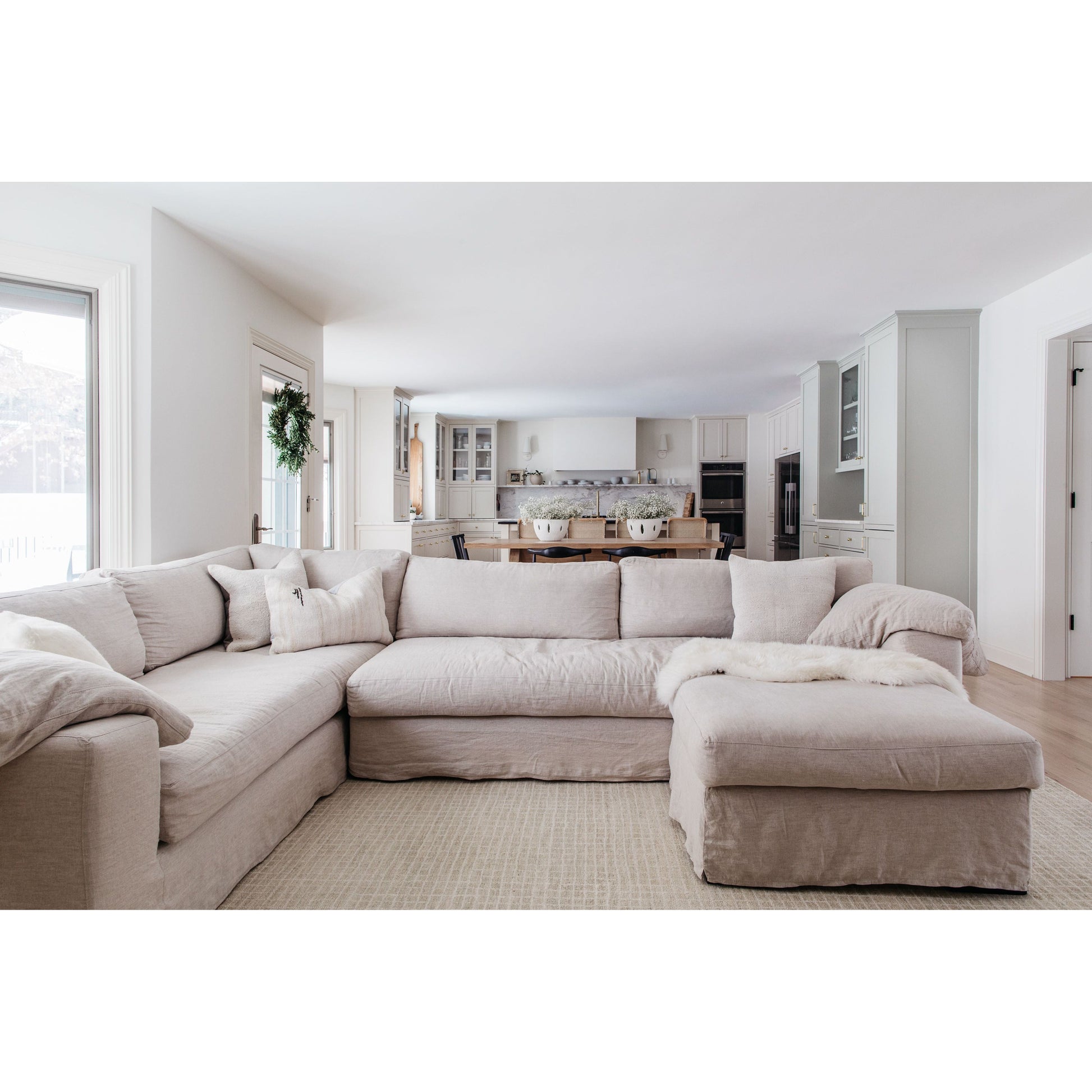 With its streamlined silhouette and strong, angular lines the Loft 2 Arm Sectional by Cisco Brothers is classic without being too traditional. It has a modern essence and elegance that lends inviting appeal to your living room. Dim the lights, and settle down with the family for an entertaining night in. Photographed in Naoki Hemp (discountinued). Shown as a Left Arm Facing Sectional.   Overall: 96"w x 130"d x 29"h