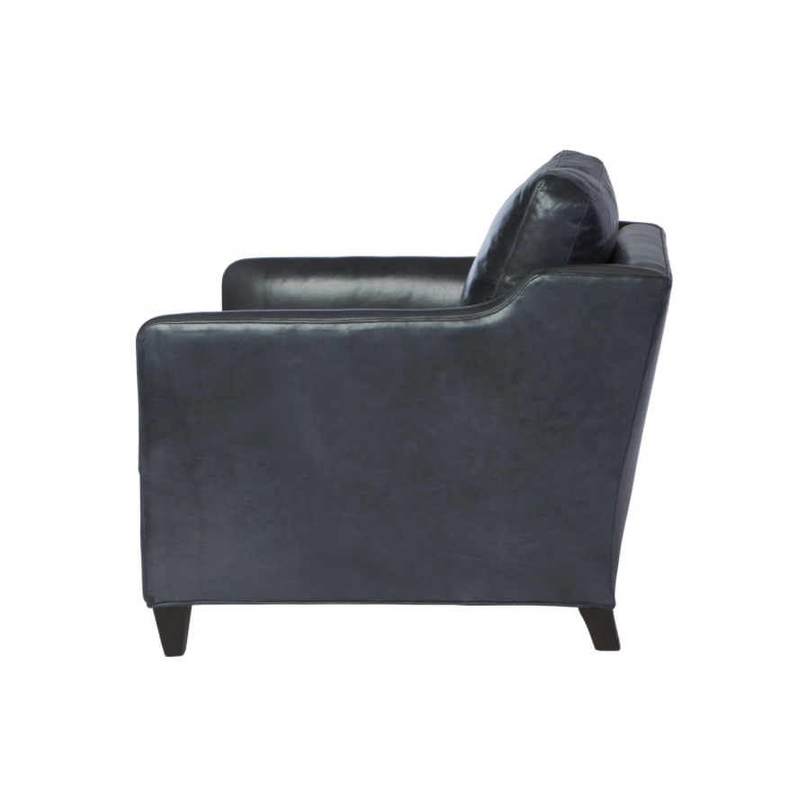 The Gunner Chair by Cisco Home has a mid century modern feel, with a modish silhouette softened by gentle curves. It’s 8 way hand tied support allows for maximum comfort. The subtly sloping arm detail add an inviting accent, making the Gunner the perfect spot to perch with a book or a cup of coffee.  Overall: 29"w x 34"d x 25"h