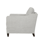 The Gunner Chair by Cisco Home has a mid century modern feel, with a modish silhouette softened by gentle curves. It’s 8 way hand tied support allows for maximum comfort. The subtly sloping arm detail add an inviting accent, making the Gunner the perfect spot to perch with a book or a cup of coffee.  Overall: 29"w x 34"d x 25"h