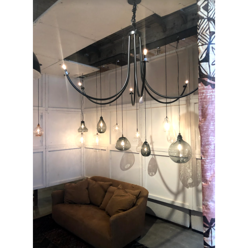 Add unique and modern lighting to a room with this Ramo Chandelier from Cisco Brothers. The curved arms add beautiful sight lines to the fixture and plenty of light.  Overall: 60”dia. 30.5"h Chain Length: 3' Canopy: 6"dia