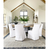 Featuring Craig Dining Chair by Dovetail at Amethyst Home. The Craig Dining Chair is featured in a gorgeous white linen slip cover in a Belgian wrinkle. The chair is comfortable, chic, and easy to care and maintain.

Belgian wrinkle white linen fabric
Birch frame

Size: 19"L x 23"d x 35"hSeat Height: 20"h.  Amethyst Home provides interior design, new home construction design consulting, vintage area rugs, and lighting in the Alpharetta metro area.