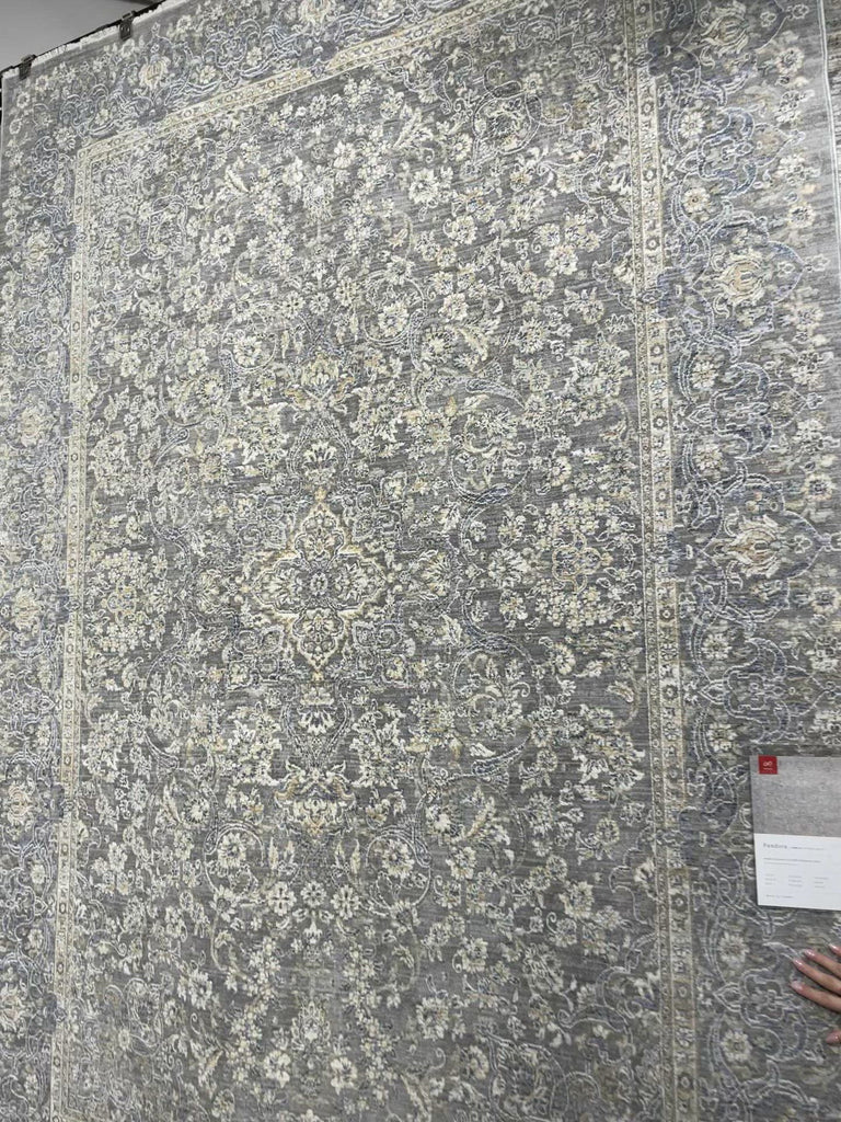 Our updated take on a classic. The Pandora Stone / Gold Area Rug is power-loomed of 100% polyester, ensuring long-lasting durability, no shedding, and a soft feel underfoot.  The pile features a high to low texture, accentuating these timeless yet current designs. This rug is great for living rooms, bedrooms, or any room where you want cozy and comfortable texture on the floor!  Power Loomed 100% Polyester PAN-01 Stone/Gold