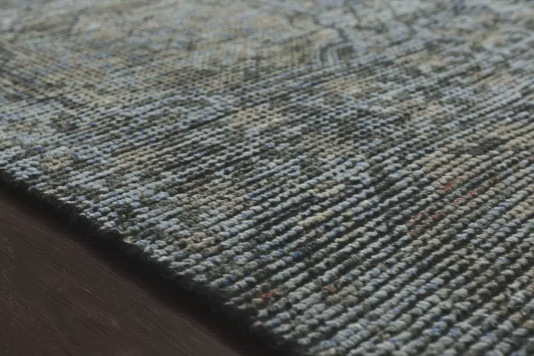 Hand-knotted in India of 100% wool, the Amara Blue/Gold Area Rug creates a casual yet refined vibe with high-end appeal. Showcase in your living room, bedroom, entryway, or other high traffic area.   Hand Knotted 100% Wool AMM-05 Blue/Gold