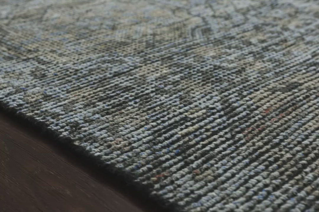 Hand-knotted in India of 100% wool, the Amara Blue/Gold Area Rug creates a casual yet refined vibe with high-end appeal. Showcase in your living room, bedroom, entryway, or other high traffic area.   Hand Knotted 100% Wool AMM-05 Blue/Gold