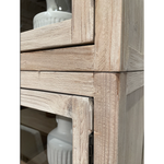 This Haley Cabinet has ample storage, with glass door panels opening to shelves and a bottom sliding door that opens to more shelves. Made from reclaimed pine with a white wash grey sealed finish, this brings an antique feel to any room.  Reclaimed Pine  White Wash Grey Sealed Finish  Flat Glass Door Panels