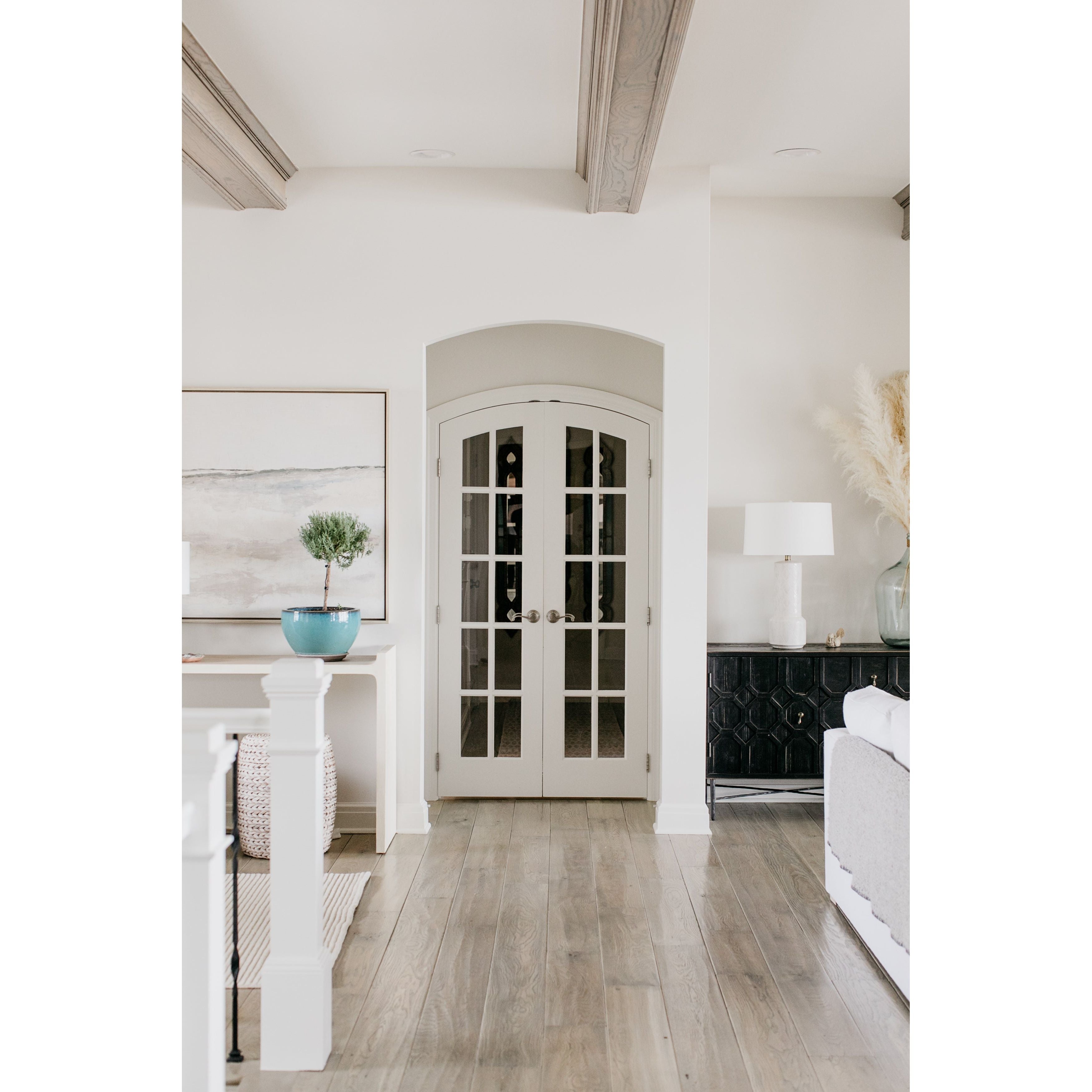 The Harten cabinet is beautifully crafted of black stained pine.  Its versatile cabinet drawer combo is perfect for both media and dining room storage.  RECLAIMED PINE AND IRON ANTIQUE BLACK Size: 63"l x 20"d x 31"h  Finish may vary slightly by piece as this is a hand-crafted product.