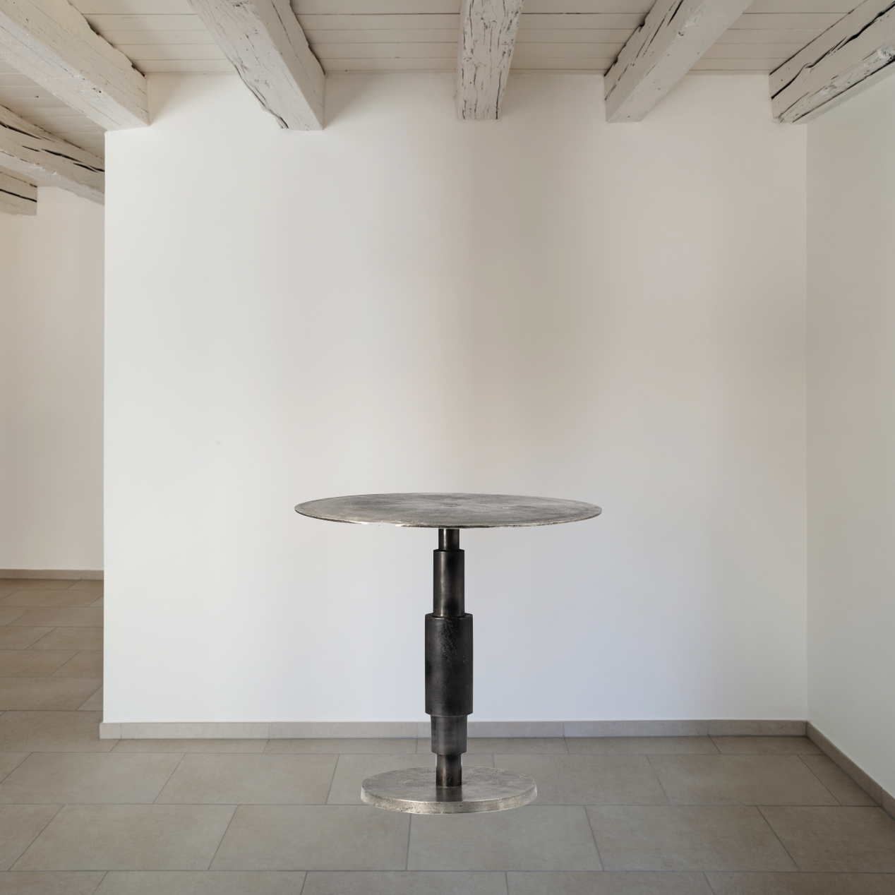 Made from cast aluminum in a raw nickel finish, this Higsby Bistro Table brings a rustic appeal to any dining room or kitchen area.  Cast Aluminum Top and Base Raw Nickel  Stem Black Nickel Finish Size: 30"l x 30"d x 30"h 