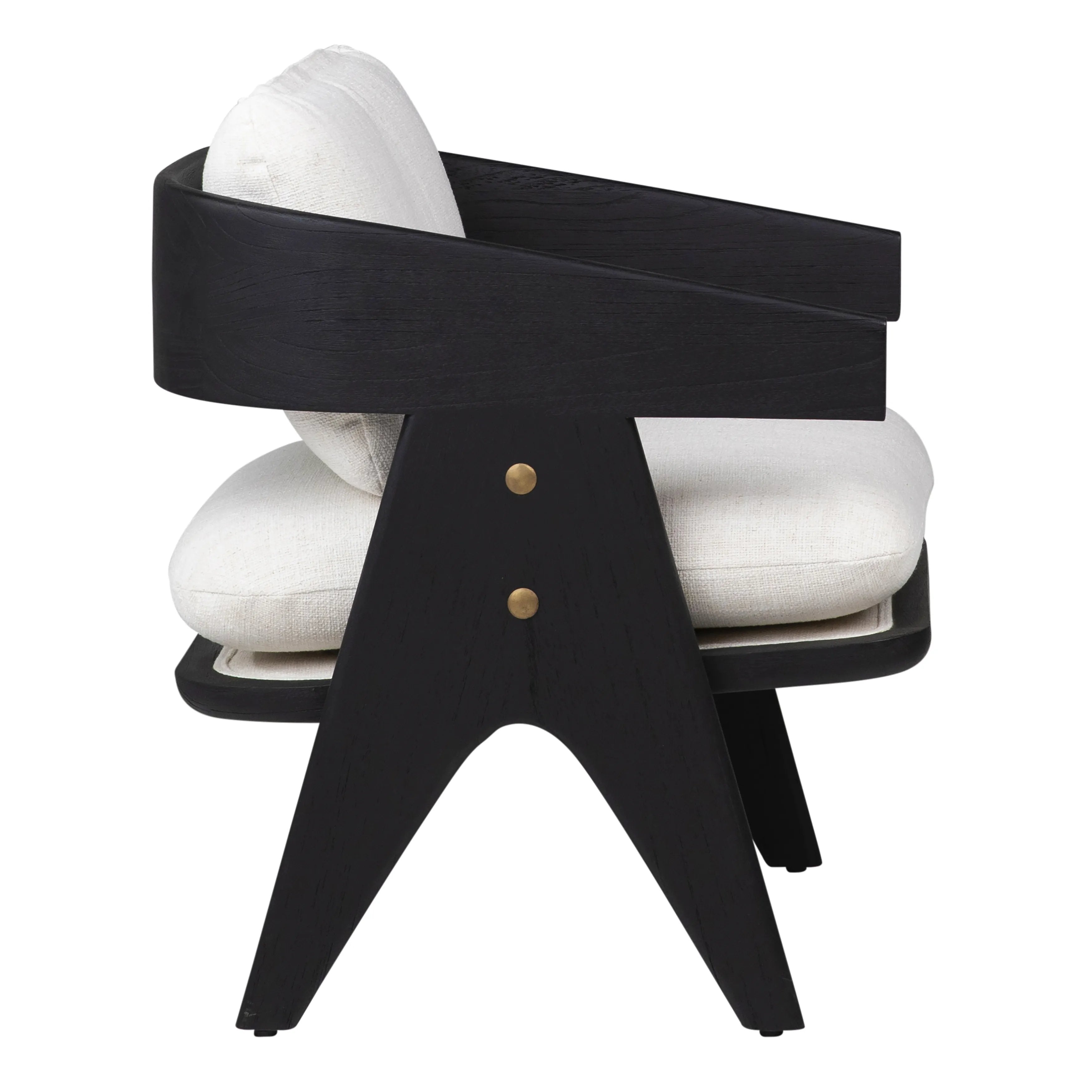 This plush chair offers a stunning silhouette that effortlessly complements any space Amethyst Home provides interior design, new home construction design consulting, vintage area rugs, and lighting in the Seattle metro area.