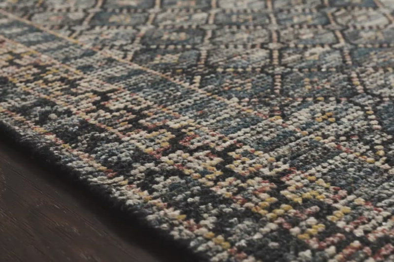 Hand-knotted in India of 100% wool, the Amara Ink/Turquoise Rug creates a casual yet refined vibe with high-end appeal. Showcase in your bedroom, living room, entryway, or other high-traffic area of your home.   Hand Knotted 100% Wool AMM-01 Ink/Turquoise