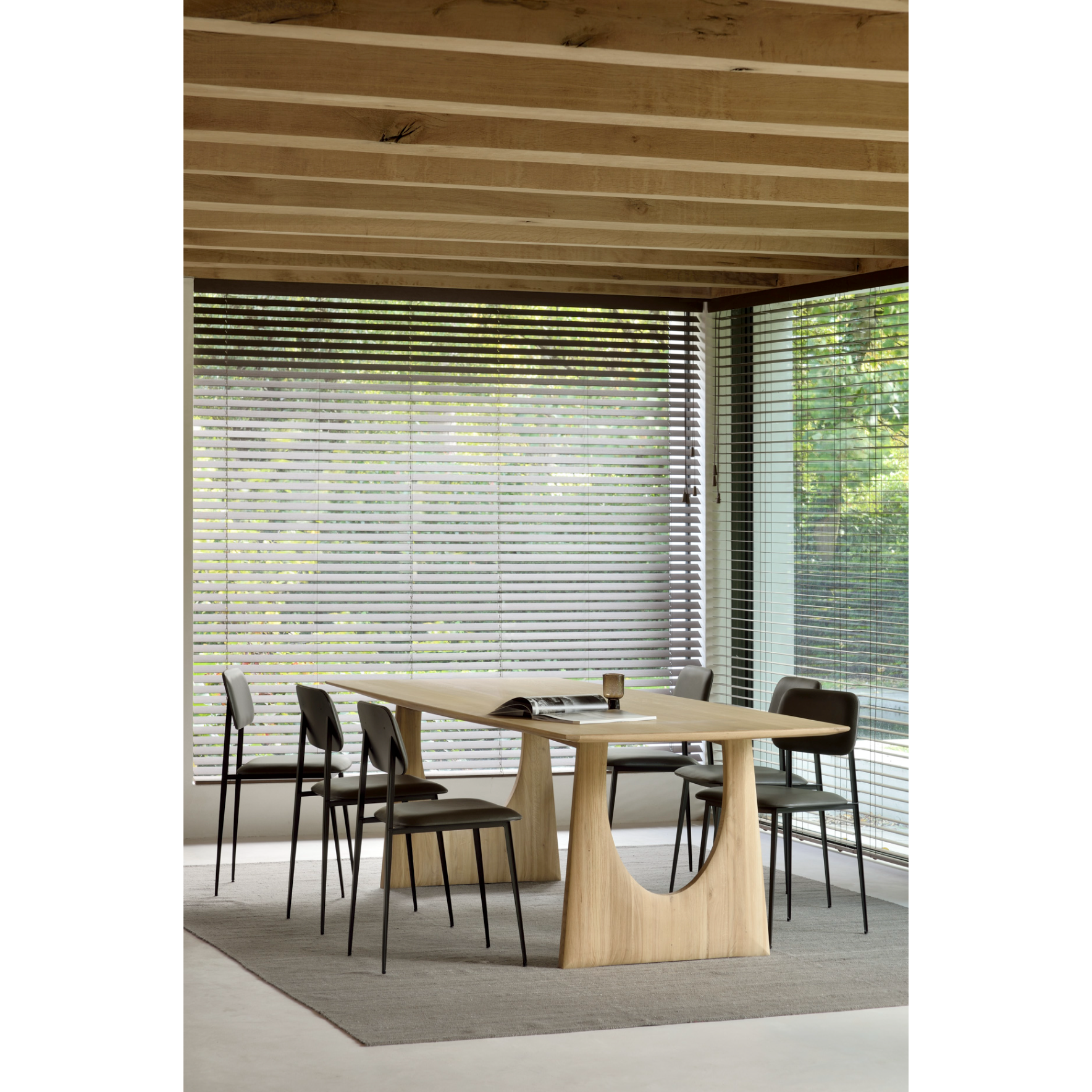 This DC Dining Chair is beautiful, minimalistic metal silhouette that would add an air of elegance to your dining table or kitchen. We love the details of the angled metal and the simplicity of this stunning chair.  Dimensions: 17"w x 19"d x 32.5"h  Weight: 19 lbs  Seat Height: 20"  Material: Metal Finish: Chocolate Leather Upholstery