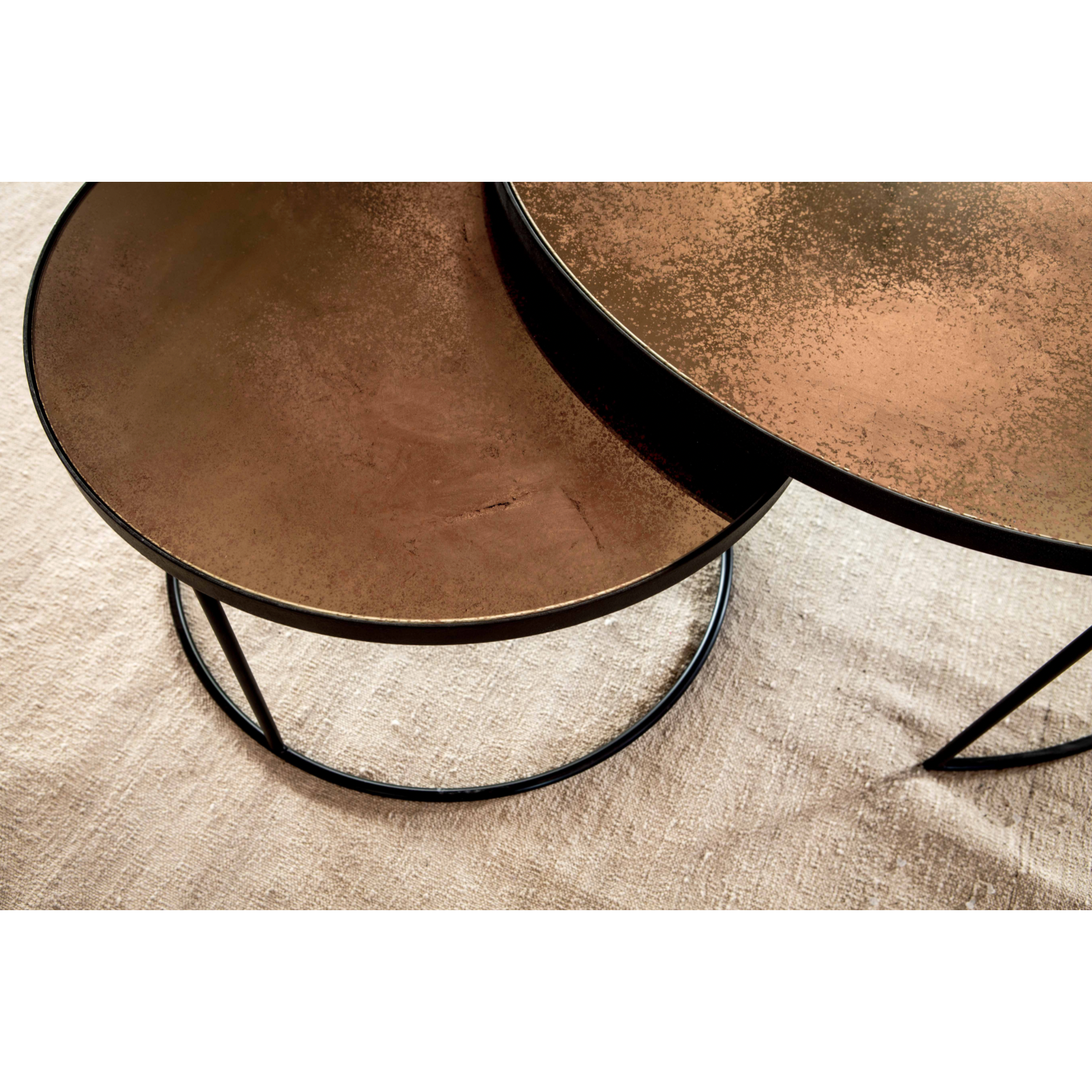 Featuring a heavy aged mirror surface, this Nesting Coffee Table Set - Bronze brings a vintage look with a modern twist to any living room or lounge area.   Dimensions: 36.5"w x 36.5"d x 16.5"h  Weight: 58 lbs  Material: Mirror