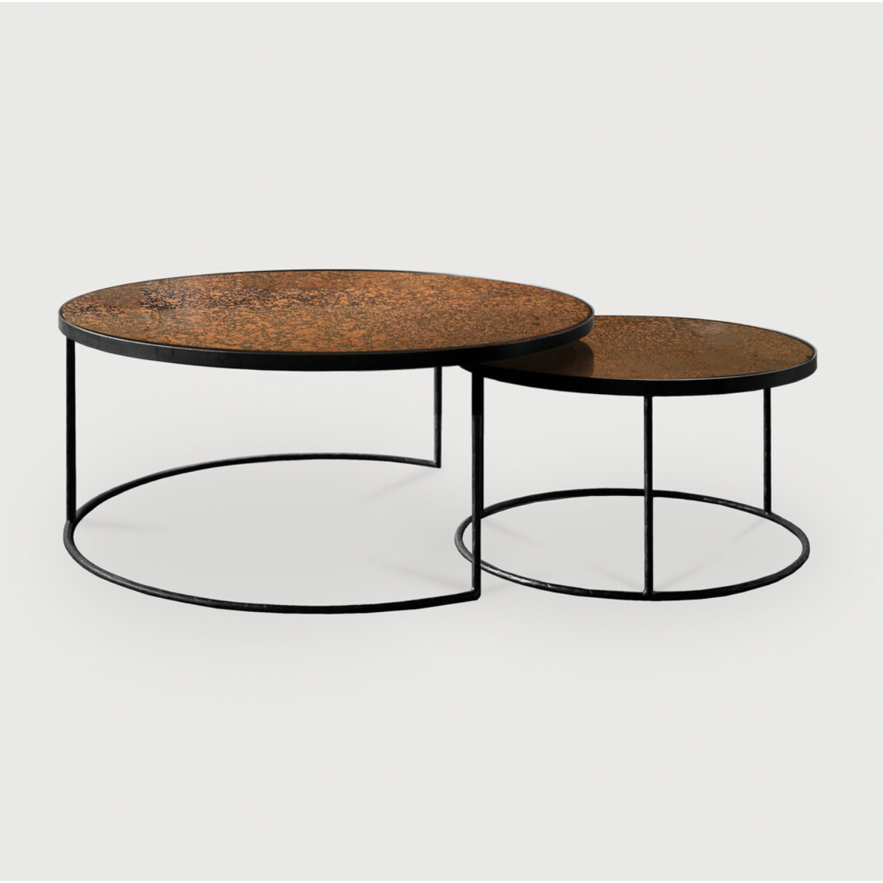 Featuring a heavy aged mirror surface, this Nesting Coffee Table Set - Bronze brings a vintage look with a modern twist to any living room or lounge area.   Dimensions: 36.5"w x 36.5"d x 16.5"h  Weight: 58 lbs  Material: Mirror