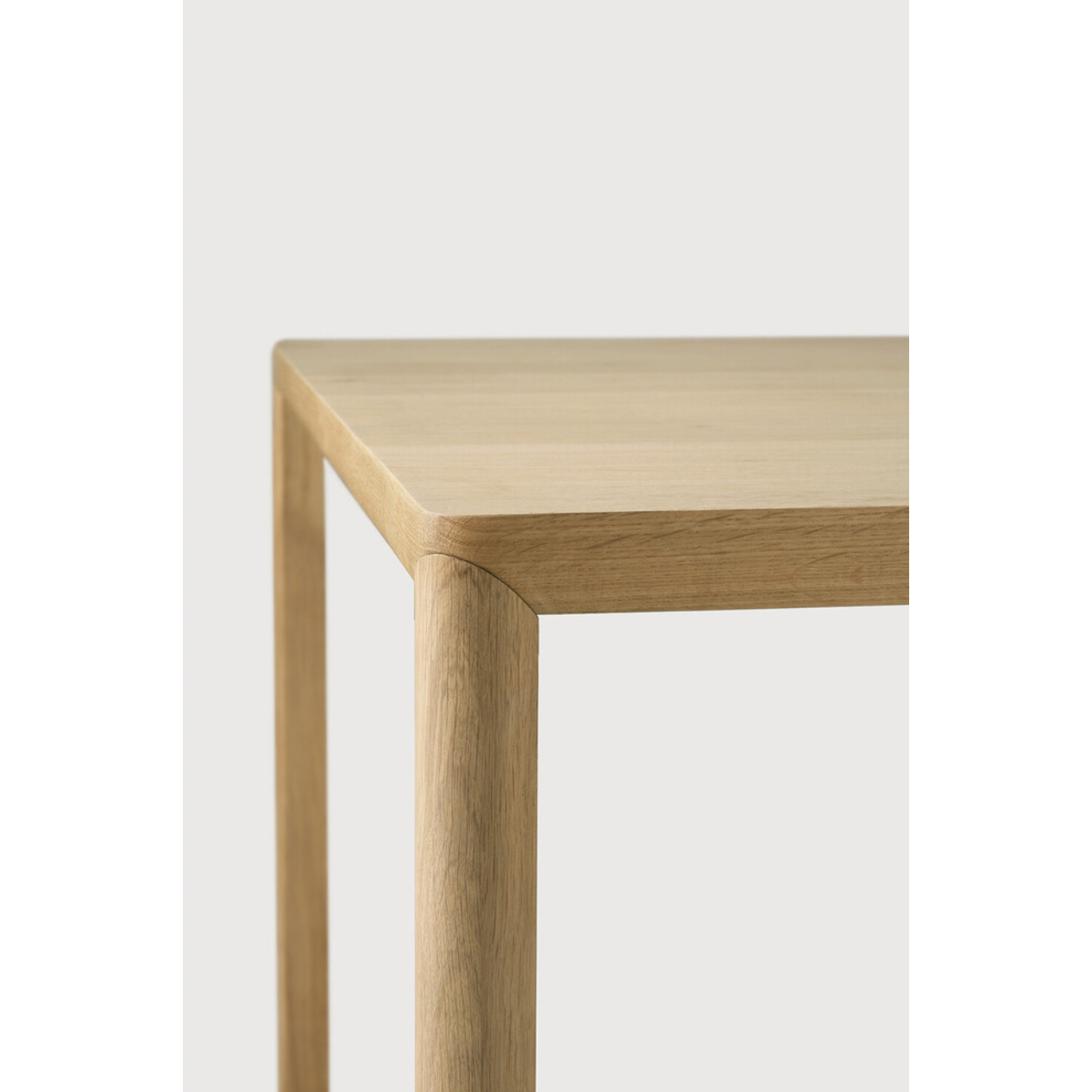 With a simple, clean and minimal design, this Oak Air Dining Table is a table to add your dining room or kitchen area of years to come. The sleek bevelled legs makes the tabletop seems to float effortlessly above.   Material: Oak, 100% Solid Wood Finish: Varnished