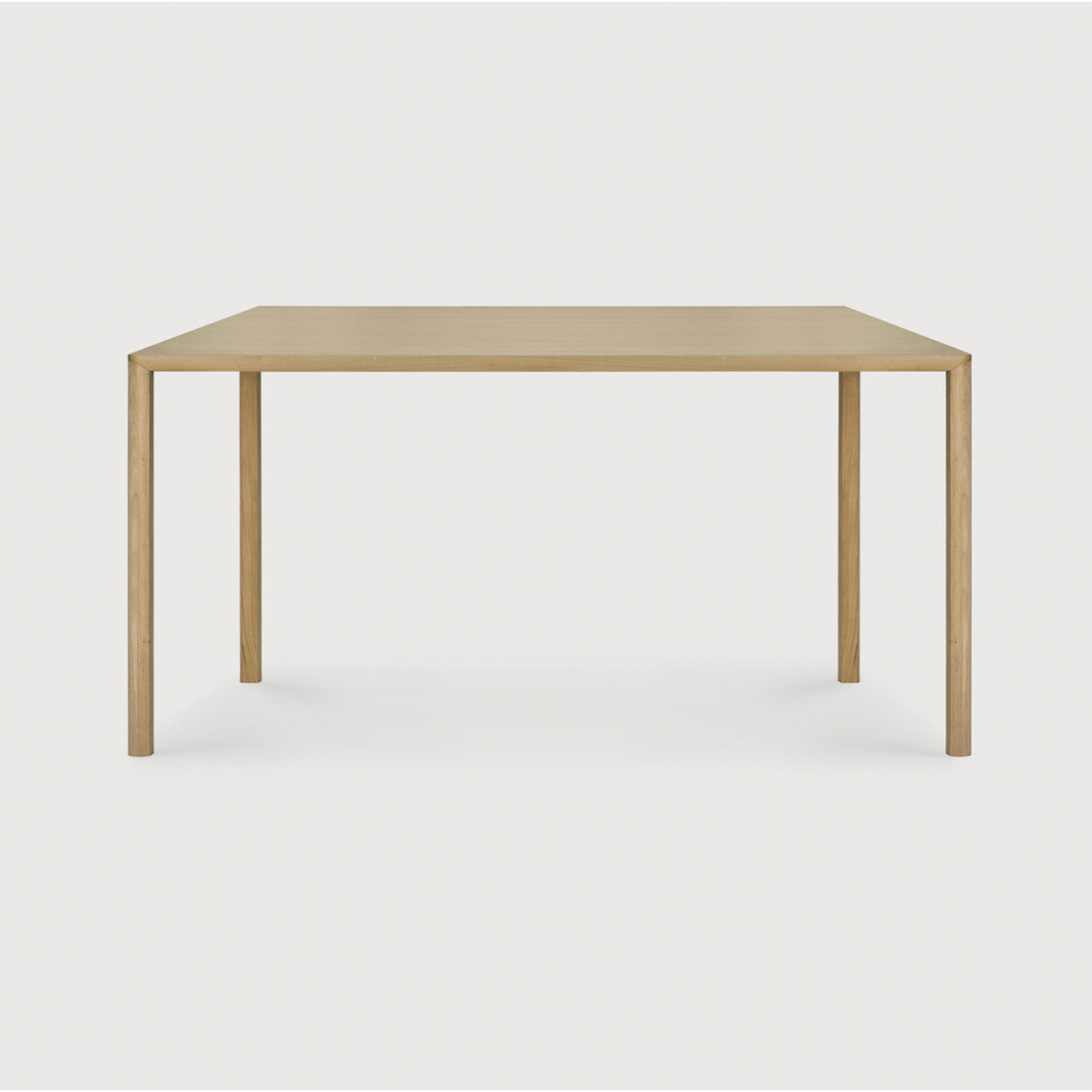 With a simple, clean and minimal design, this Oak Air Dining Table is a table to add your dining room or kitchen area of years to come. The sleek bevelled legs makes the tabletop seems to float effortlessly above.   Material: Oak, 100% Solid Wood Finish: Varnished