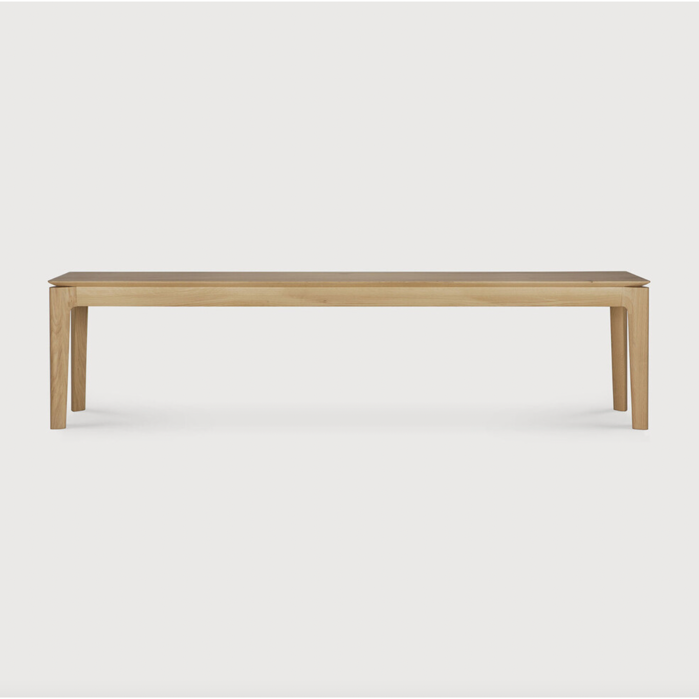 This Oak Bok Bench features an airy shape with rock-solid construction,  making this piece a timeless and remarkable design to enjoy for years to come. Pair with a dining table or stand-alone against a wall, hallway, or end of the bed!  Material: Oak Finish: Oiled