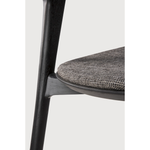 This Oak Bok Dining Chair features an airy shape with rock-solid construction,  making this piece a timeless and remarkable design to enjoy for years to come. Pair with a dining table or stand-alone against a wall, hallway, or end of the bed! Designed by Alain can Havre  Dimensions: 20"w x 21.5"d x 30"h  Weight: 15 lbs  Seat Height: 19"  Material: Oak, 100% solid wood Finish: Varnished