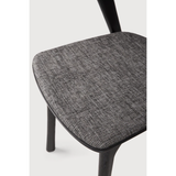 This Oak Bok Dining Chair features an airy shape with rock-solid construction,  making this piece a timeless and remarkable design to enjoy for years to come. Pair with a dining table or stand-alone against a wall, hallway, or end of the bed! Designed by Alain can Havre  Dimensions: 20"w x 21.5"d x 30"h  Weight: 15 lbs  Seat Height: 19"  Material: Oak, 100% solid wood Finish: Varnished