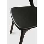 Featuring Oak Bok Dining Chair - Black - Black Leather by Ethnicraft at Amethyst Home. This Oak Bok Dining Chair features an airy shape with rock-solid construction,  making this piece a timeless and remarkable design to enjoy for years to come. Pair with a dining table or stand-alone against a wall, hallway, or end of the bed! Designed by Alain can Ha.  Amethyst Home provides interior design, new home construction design consulting, vintage area rugs, and lighting in the Newport Beach metro area.