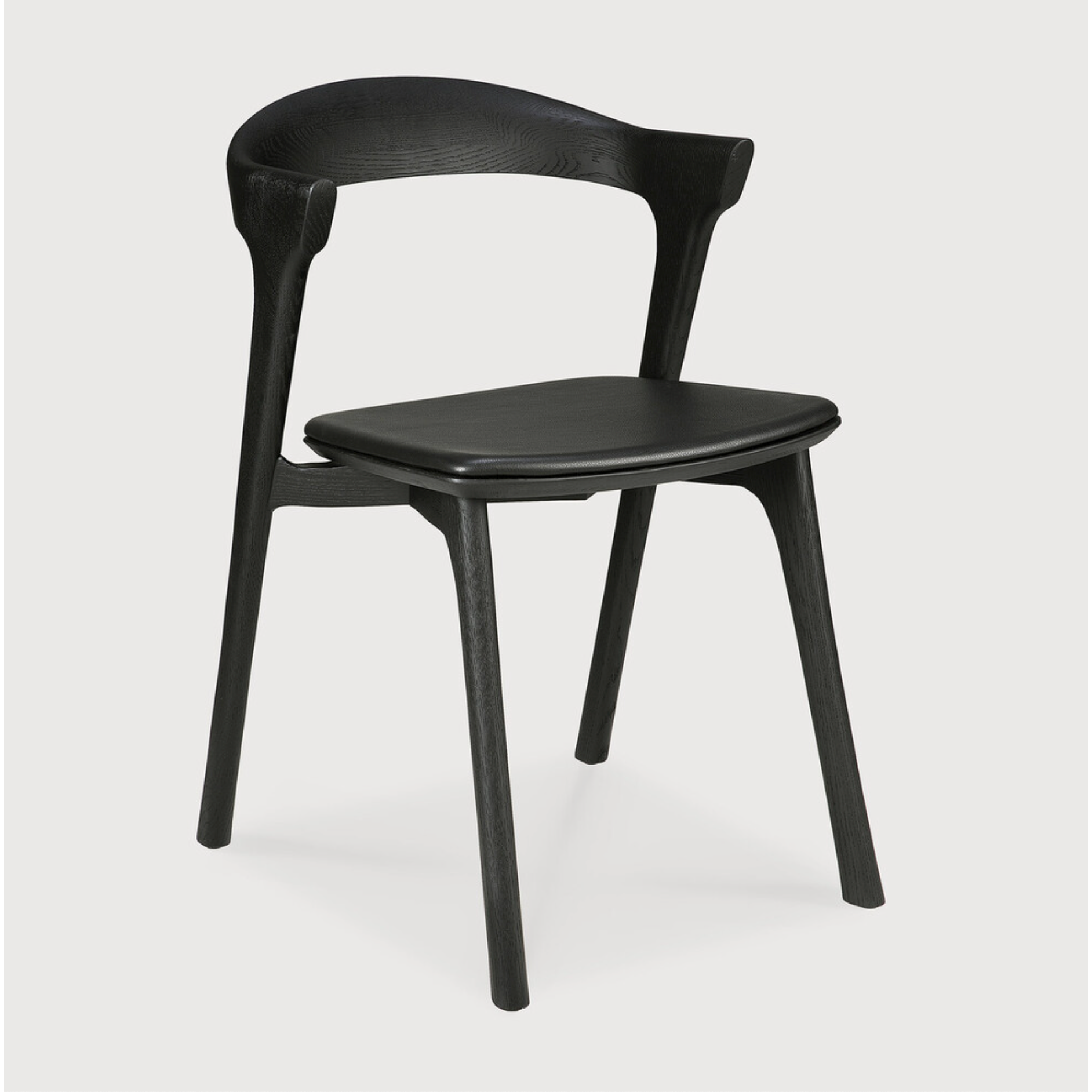 This Oak Bok Dining Chair features an airy shape with rock-solid construction,  making this piece a timeless and remarkable design to enjoy for years to come. Pair with a dining table or stand-alone against a wall, hallway, or end of the bed! Designed by Alain can Havre  Dimensions: 20"w x 21.5"d x 30"h  Weight: 15 lbs  Seat Height: 19"  Material: Oak, 100% solid wood Finish: Varnished