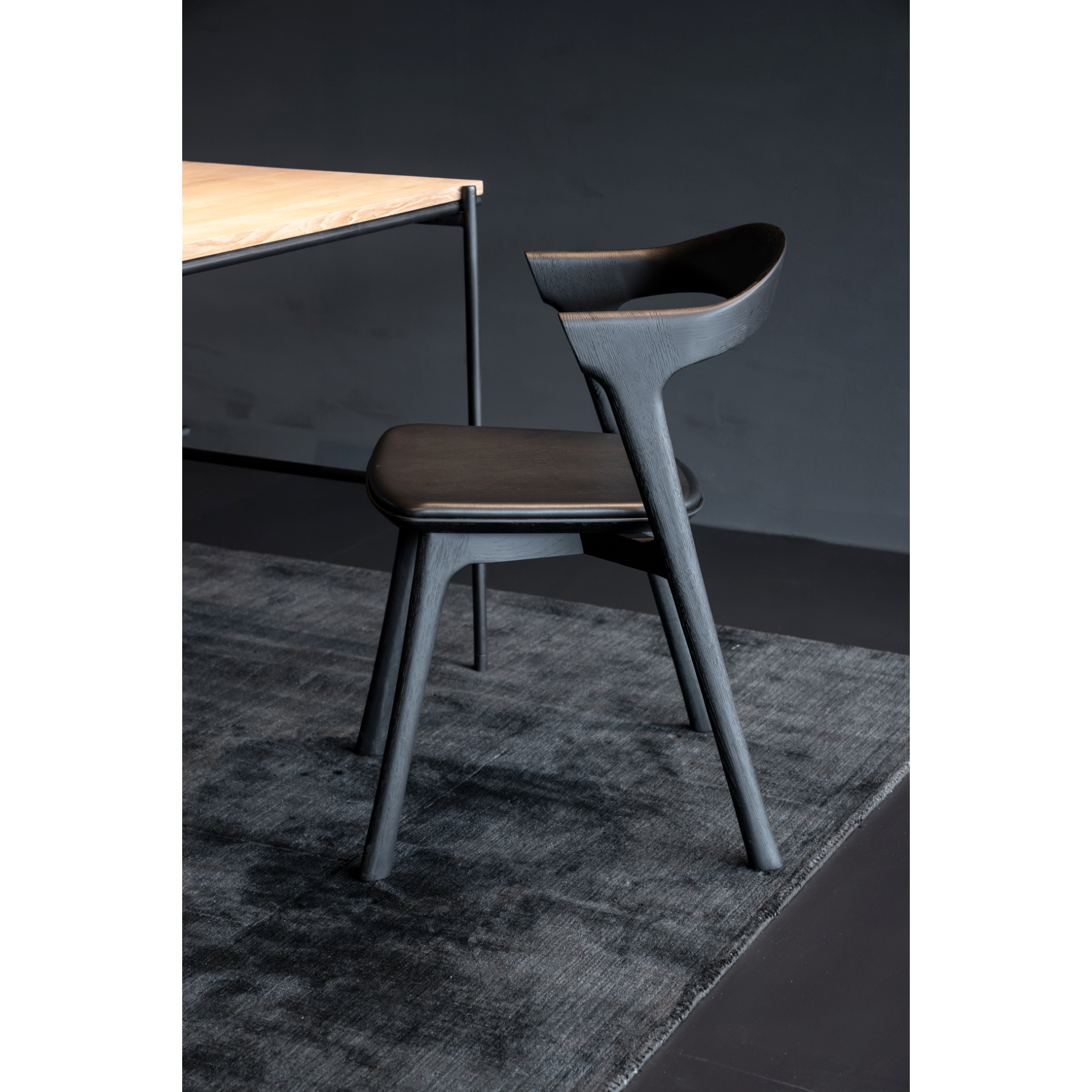 This Oak Bok Dining Chair features an airy shape with rock-solid construction,  making this piece a timeless and remarkable design to enjoy for years to come. Pair with a dining table or stand-alone against a wall, hallway, or end of the bed! Designed by Alain can Havre  Dimensions: 20"w x 21.5"d x 30"h  Weight: 15 lbs  Seat Height: 19"  Material: Oak, 100% solid wood Finish: Varnished