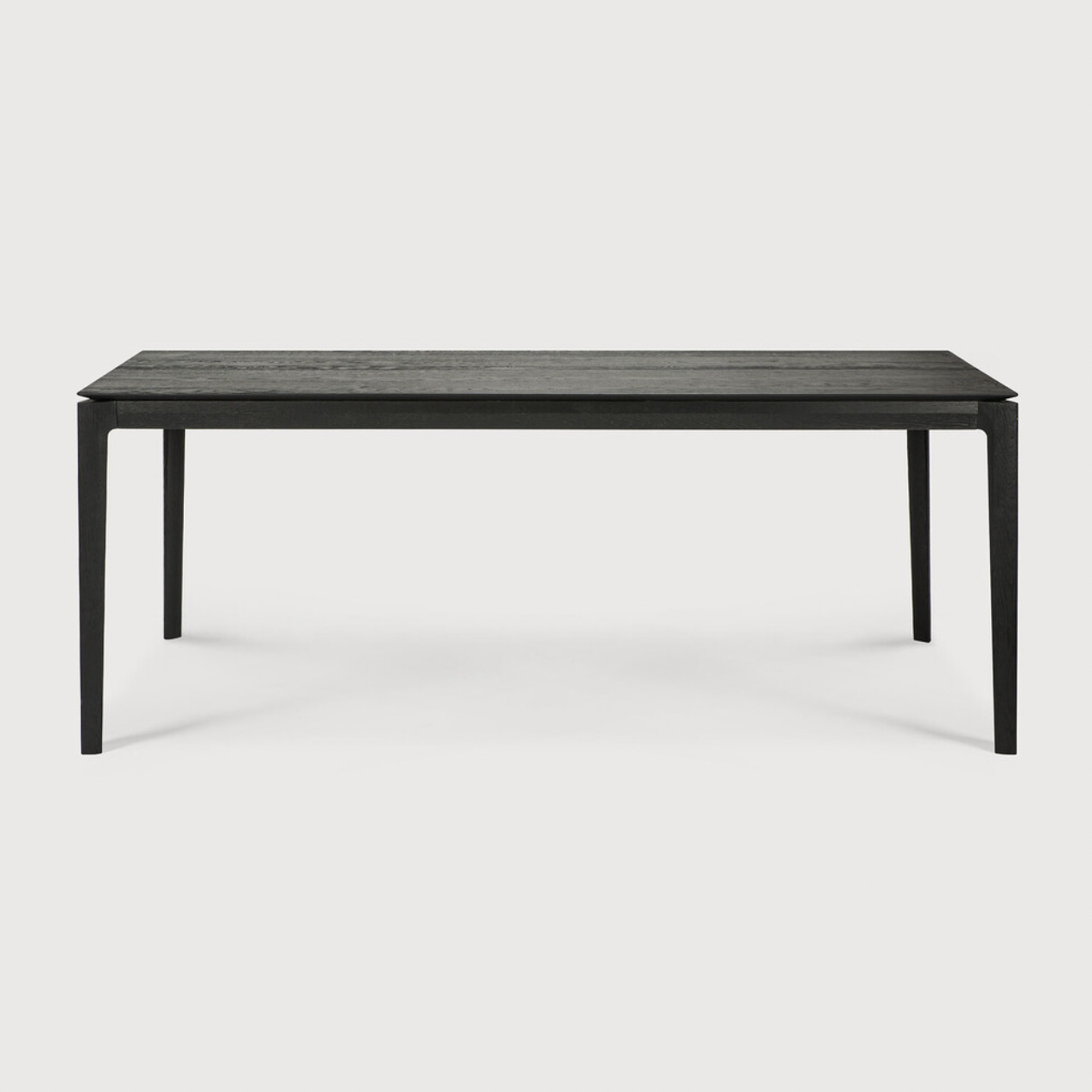 The airy shape yet rock solid construction make this Oak Bok Dining Table - Black a timeless and remarkable design to enjoy for years to come. Available in many sizes, this can fit any dining room or kitchen area.   Material: Oak, 100% Solid Wood Finish: Varnished