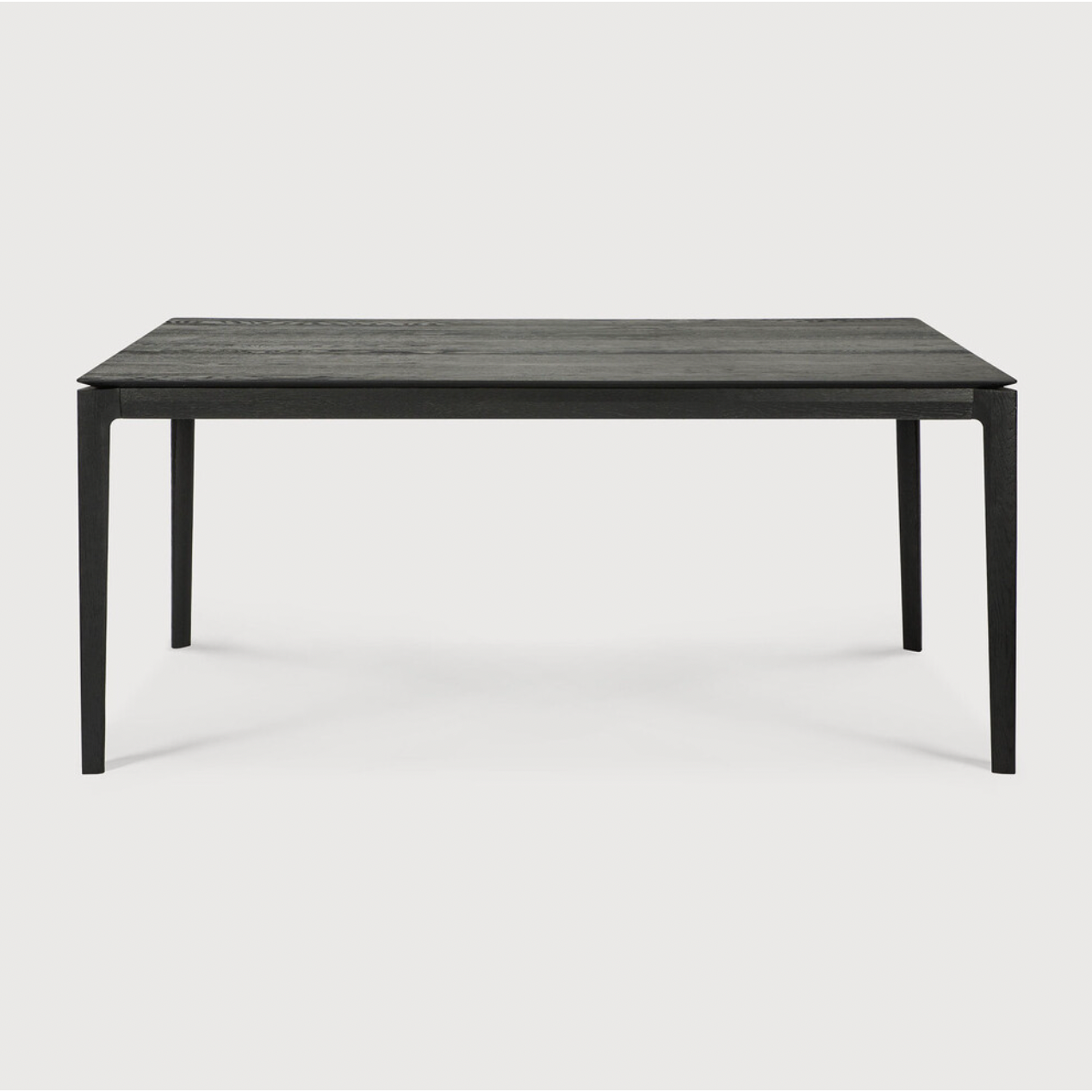 The airy shape yet rock solid construction make this Oak Bok Dining Table - Black a timeless and remarkable design to enjoy for years to come. Available in many sizes, this can fit any dining room or kitchen area.   Material: Oak, 100% Solid Wood Finish: Varnished