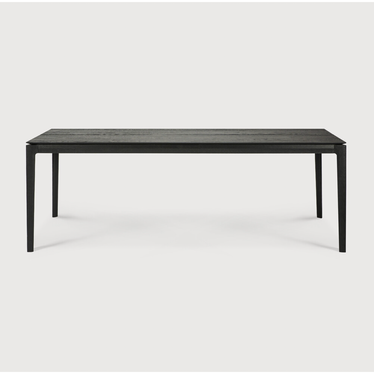 The airy shape yet rock solid construction make this Oak Bok Dining Table - Black a timeless and remarkable design to enjoy for years to come. Available in many sizes, this can fit any dining room or kitchen area.   Material: Oak, 100% Solid Wood Finish: Varnished