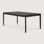 The airy shape yet rock solid construction make this Oak Bok Dining Table - Black a timeless and remarkable design to enjoy for years to come. Available in many sizes, this can fit any dining room or kitchen area.   Material: Oak, 100% Solid Wood Finish: Varnished