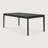 The airy shape yet rock solid construction make this Oak Bok Dining Table - Black a timeless and remarkable design to enjoy for years to come. Available in many sizes, this can fit any dining room or kitchen area.   Material: Oak, 100% Solid Wood Finish: Varnished