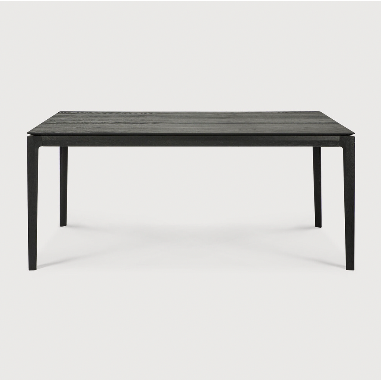 The airy shape yet rock solid construction make this Oak Bok Dining Table - Black a timeless and remarkable design to enjoy for years to come. Available in many sizes, this can fit any dining room or kitchen area.   Material: Oak, 100% Solid Wood Finish: Varnished