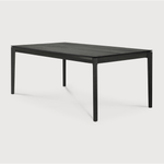 The airy shape yet rock solid construction make this Oak Bok Dining Table - Black a timeless and remarkable design to enjoy for years to come. Available in many sizes, this can fit any dining room or kitchen area.   Material: Oak, 100% Solid Wood Finish: Varnished