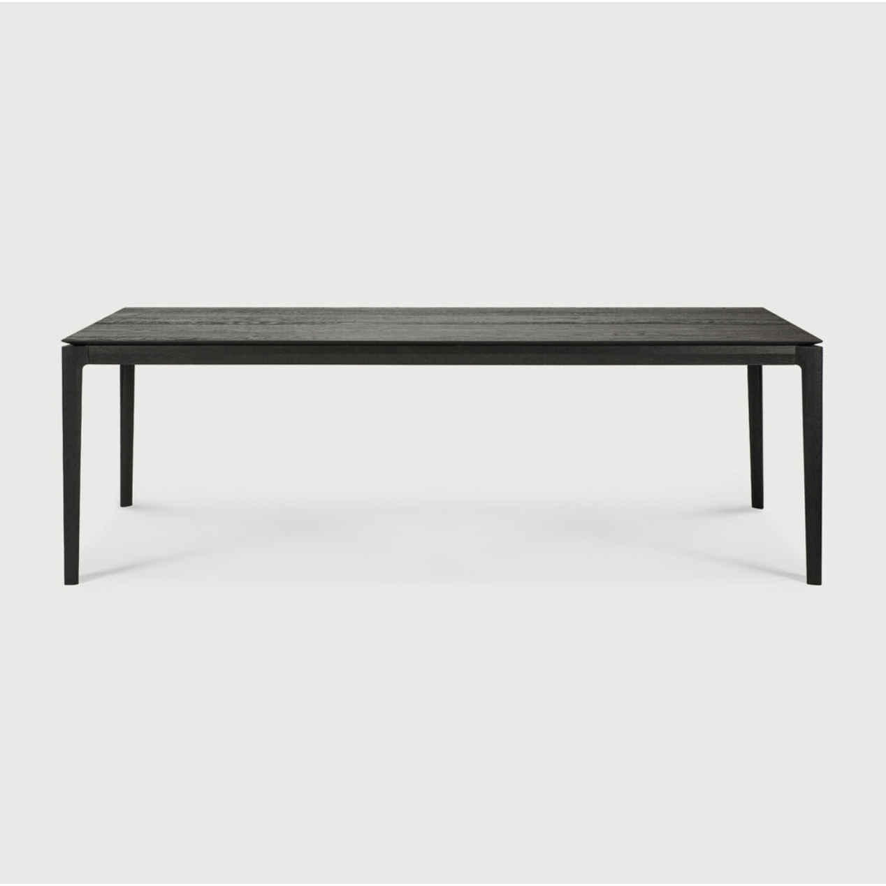 The airy shape yet rock solid construction make this Oak Bok Dining Table - Black a timeless and remarkable design to enjoy for years to come. Available in many sizes, this can fit any dining room or kitchen area.   Material: Oak, 100% Solid Wood Finish: Varnished