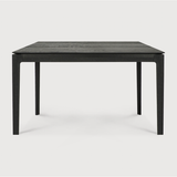 The airy shape yet rock solid construction make this Oak Bok Dining Table - Black a timeless and remarkable design to enjoy for years to come. Available in many sizes, this can fit any dining room or kitchen area.   Material: Oak, 100% Solid Wood Finish: Varnished
